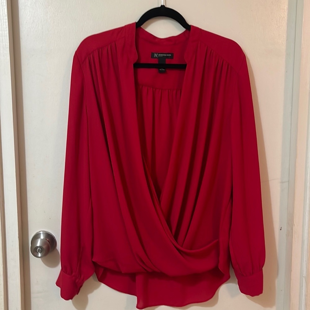Beautiful I.N.C. red blouse in size 16W.